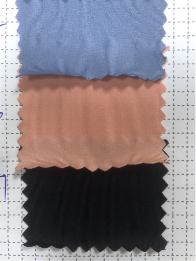 SX-DY 521010  50D牛奶絲滌綸拉架  規格：160CM 克重：100G 成份：88T 12SP 超薄運動布 後面照